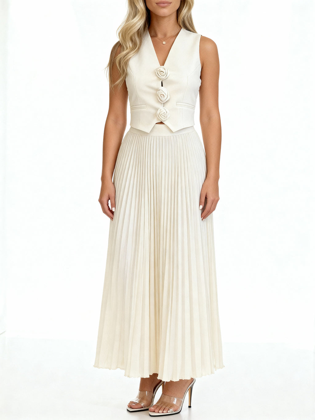 Leandra | Conjunto plisado con chaleco floral y falda midi