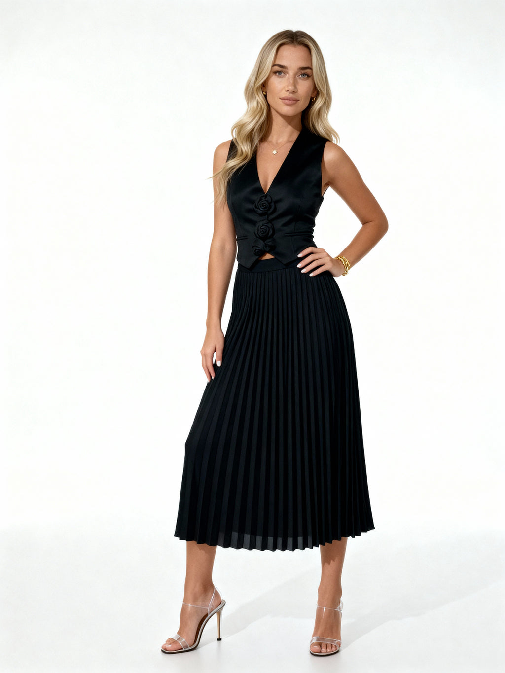 Leandra | Conjunto plisado con chaleco floral y falda midi