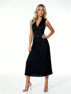 Leandra | Conjunto plisado con chaleco floral y falda midi