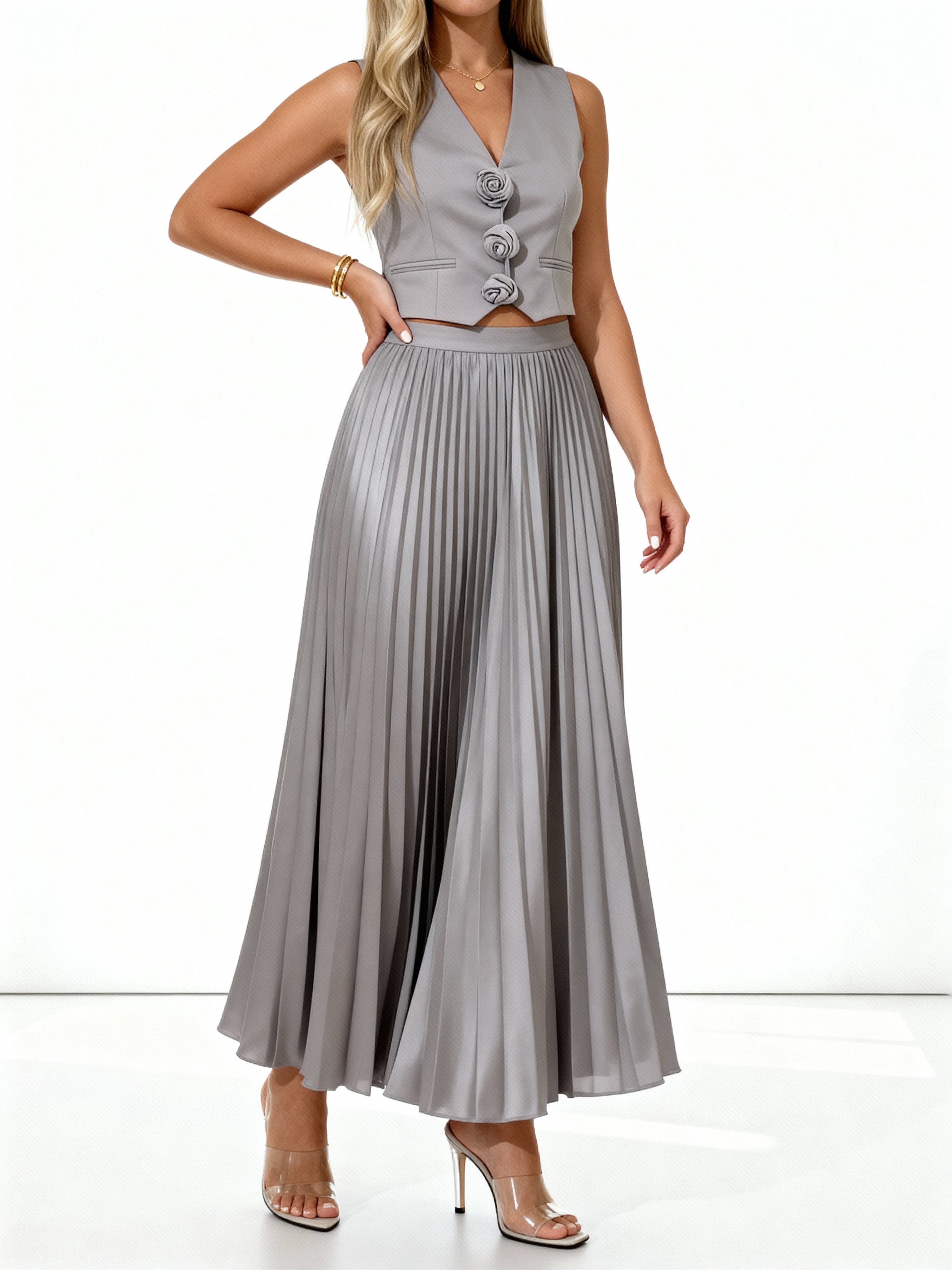 Leandra | Conjunto plisado con chaleco floral y falda midi