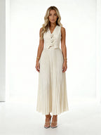 Leandra | Conjunto plisado con chaleco floral y falda midi