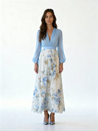 Elara | Vestido largo con cuerpo cruzado y falda floral vaporosa